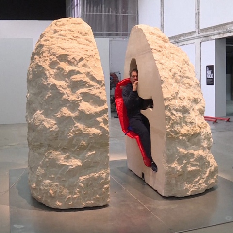 Photo: Artist Entombed in a Hollow Rock